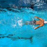 Top view of a boy swimming