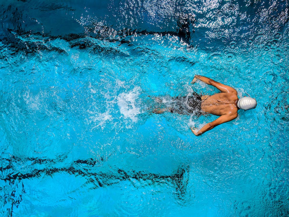 Top view of a boy swimming